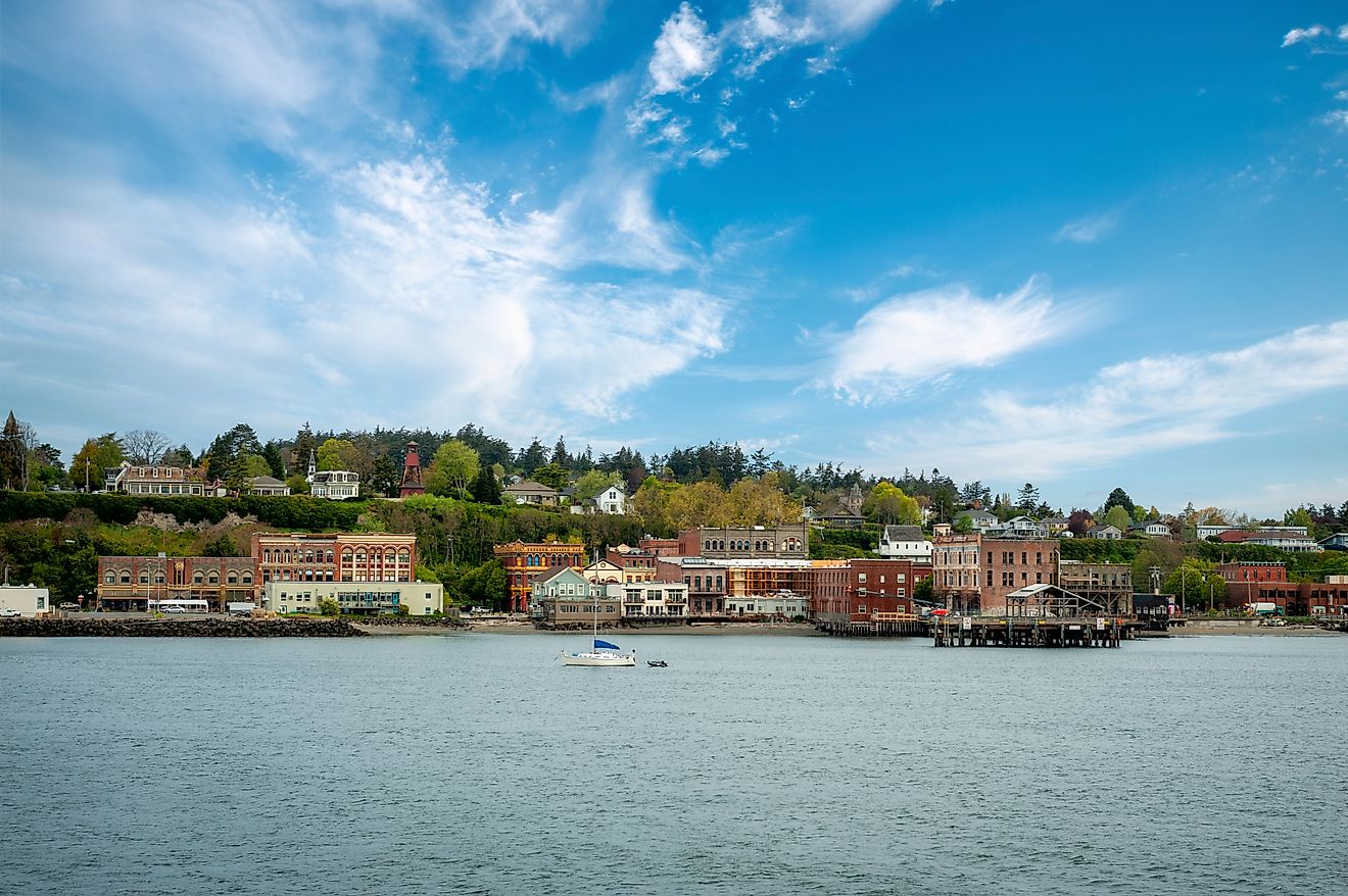 View of the shoreline lined with waterfront buildings in Port Townsend, Washington.