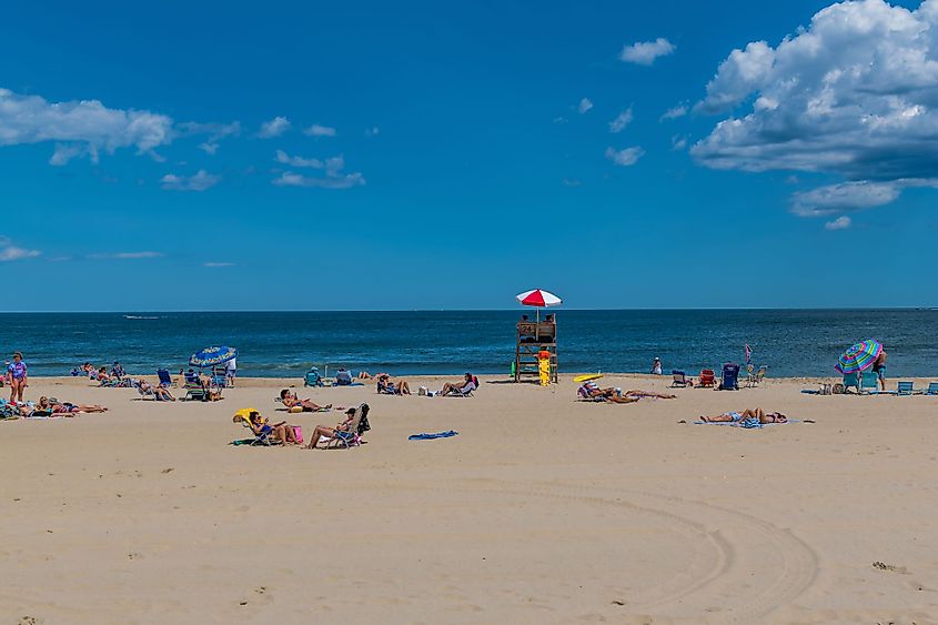 People enjoy a beautiful beach day in Spring Lake, New Jersey.
