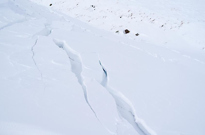 Cracks in the snow before the avalanche begins.
