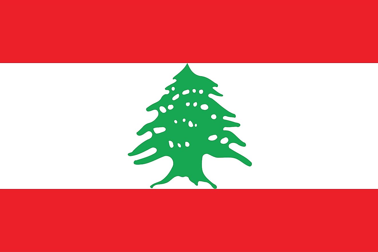 The flag of Lebanon is a tricolor flag of red (top), white (double width), and red horizontal bands with green cedar tree centered on white     