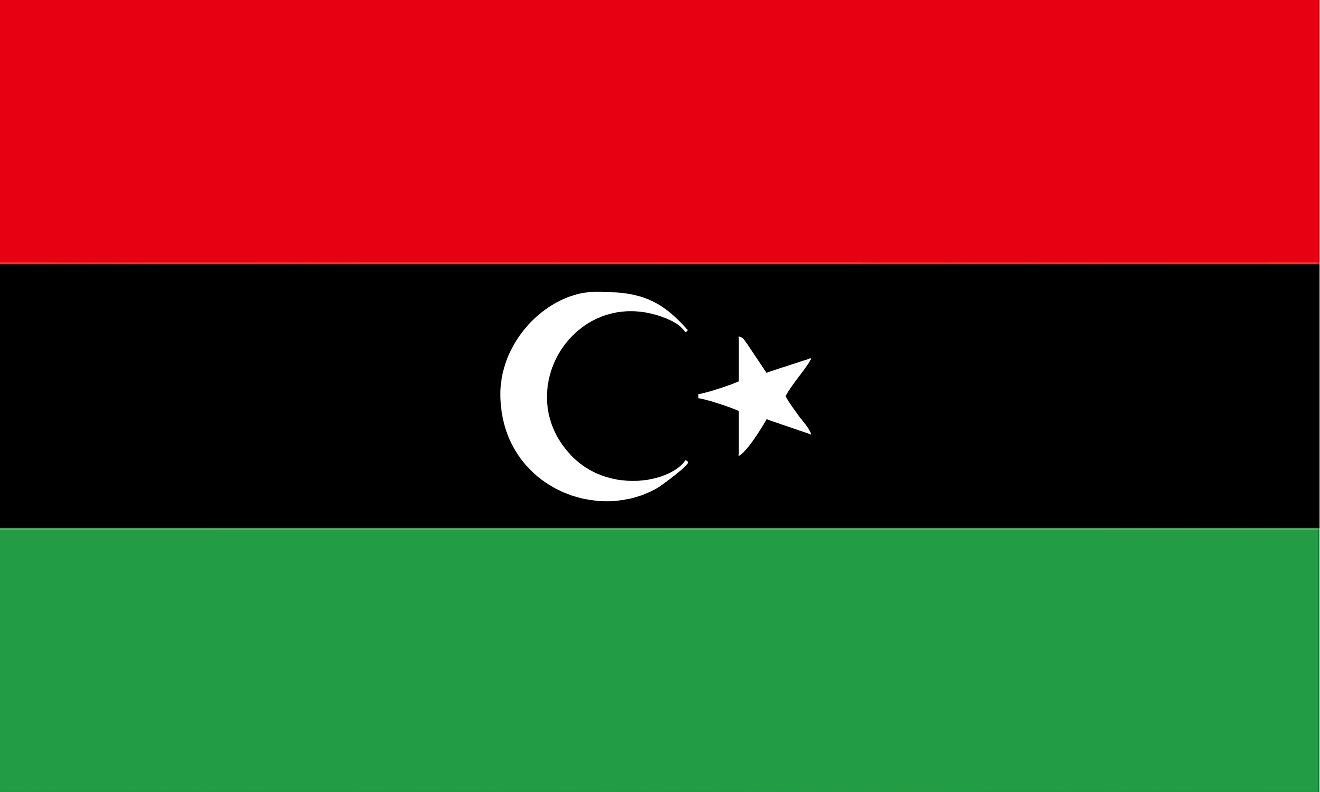 The flag of Libya is a tricolor flag of red, black, and green horizontal bands with white crescent and 5-pointed star centered on black