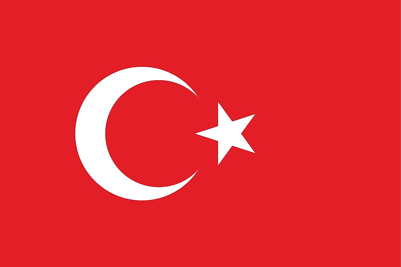 The National Flag of Turkey features a red background with a vertical white crescent moon (the closed portion of which is towards the hoist side) and a white five-pointed star centered just outside the crescent opening; both of which are placed slightly t