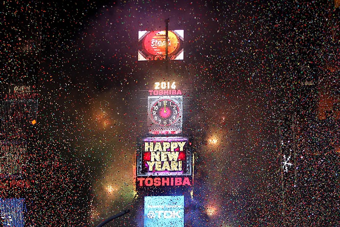 Confetti fills the air as crowds celebrate the annual New Year's Eve Ball Drop in New York City's Times Square. Editorial credit: Debby Wong / Shutterstock.com.