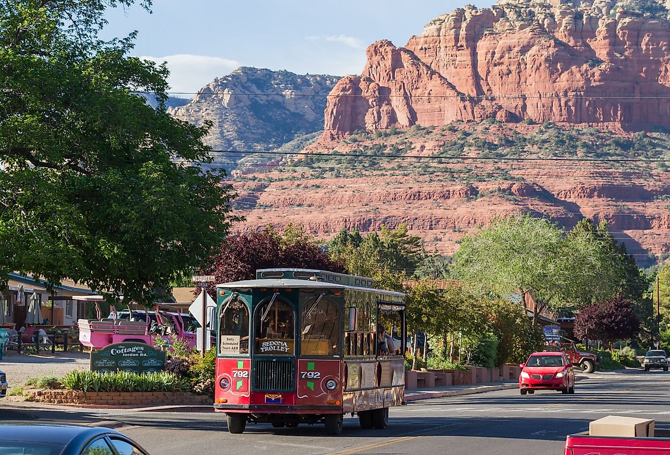 Sedona Trolley giving a tour of Sedona, Arizona and scenery, in spring. Image credit Wollertz via Shutterstock