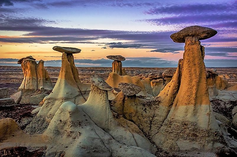 The unique Ah-Shi-Sle-Pah "hoodoos" (foreground) amidst the badlands (background) of San Juan County, New Mexico, United States of America.