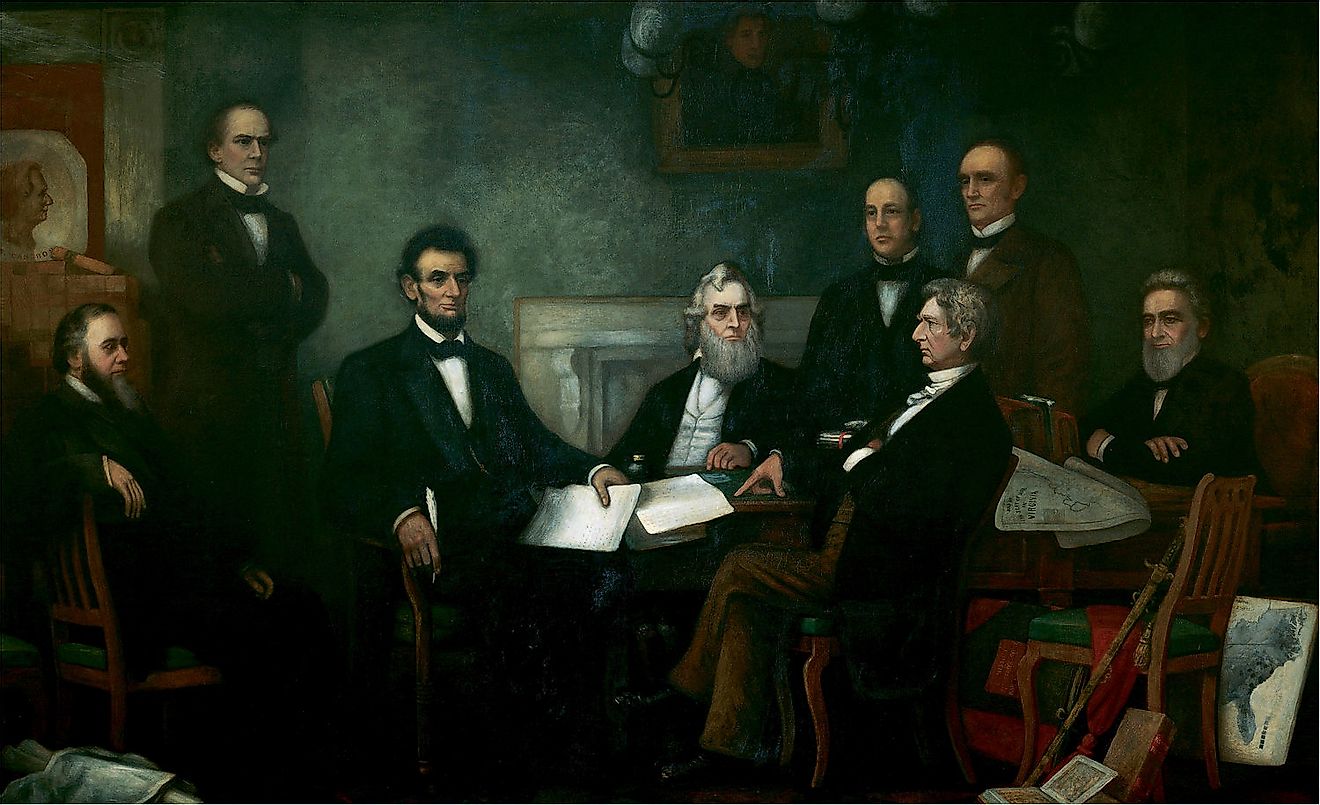 Lincoln meets with his cabinet at the First Reading of the Emancipation Proclamation, a presidential declaration that freed 3 million enslaved people.