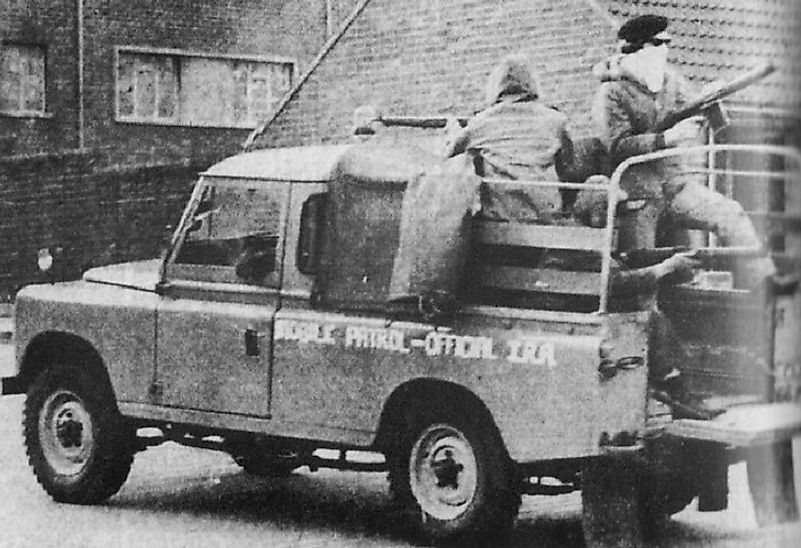 IRA members patrolling the streets of Belfast, Northern Ireland in 1972.