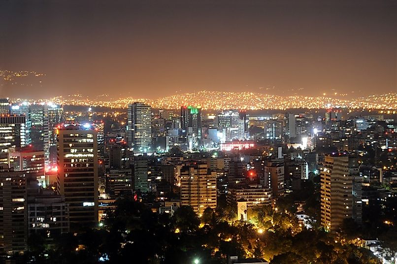 The modern metropolis of Mexico City and its millions of residents light up the skies each night as far as the eye can see.