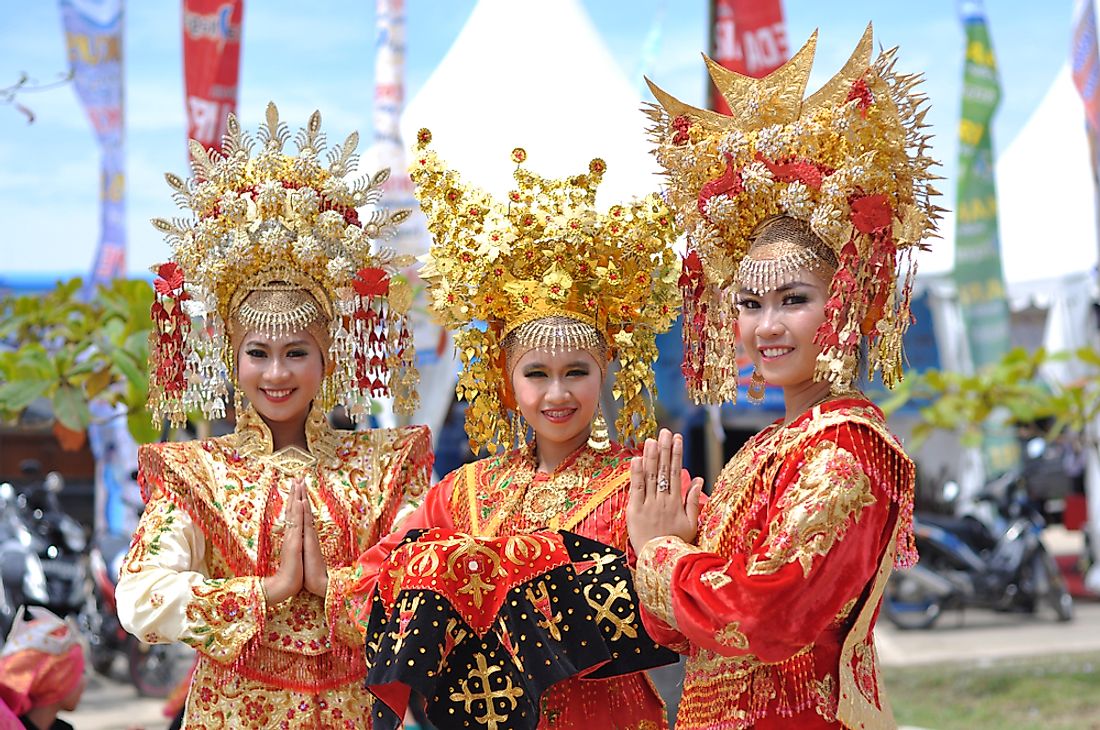 Minangkabau women decorated in traditional clothing in Indonesia. Editorial credit: KiwiGraphy Studio / Shutterstock.com.