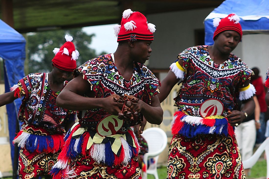 Igbo men perform a traditional dance in Nigeria. Editorial credit: Lorimer Images / Shutterstock.com.