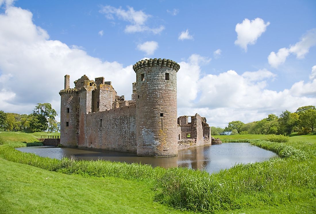 The moated Caerlaverock Castle in Scotland was built in the 13th century.