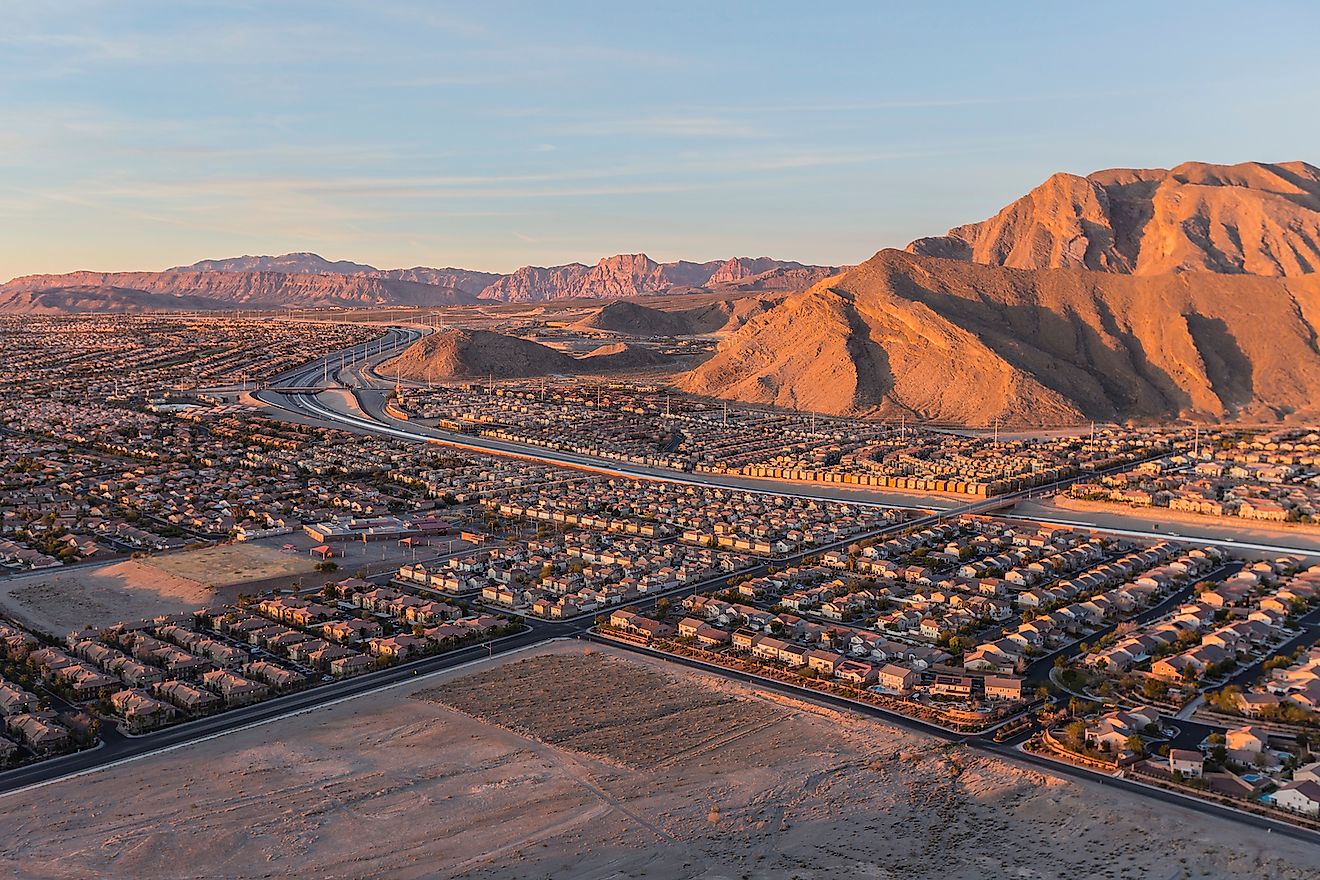 Early morning view of new neighborhoods and Route 215 from the top of Lone Mountain in Northwest Las Vegas. Image credit: trekandshoot/Shutterstock.com