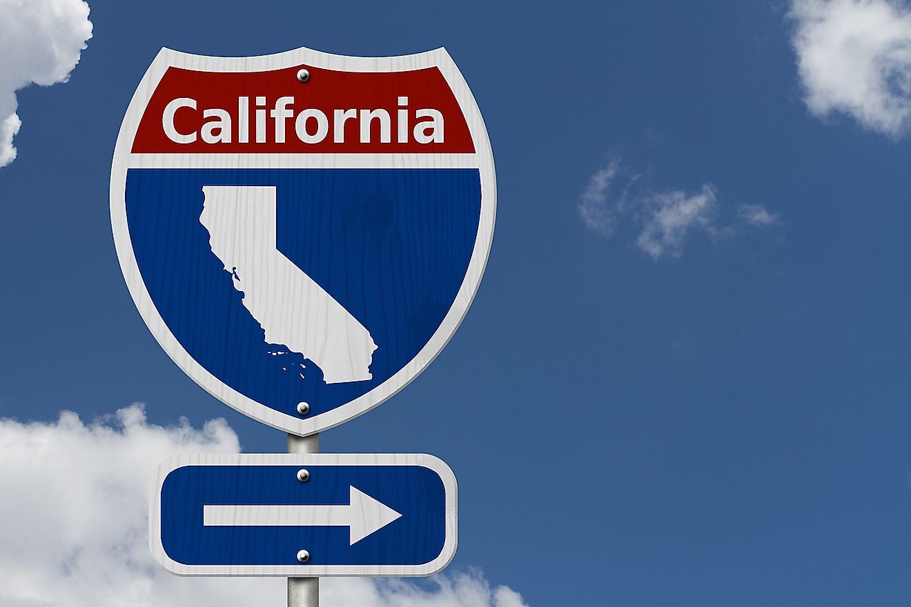 A roadsign with the map of California. Image credit: Karen Roach/Shutterstock.com