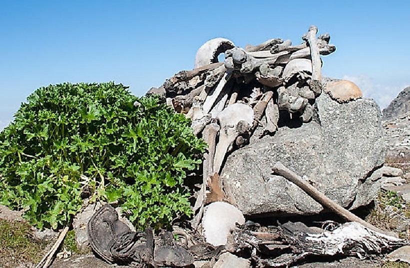 Stacks of human skeletal remains along the shores of Roopkund.