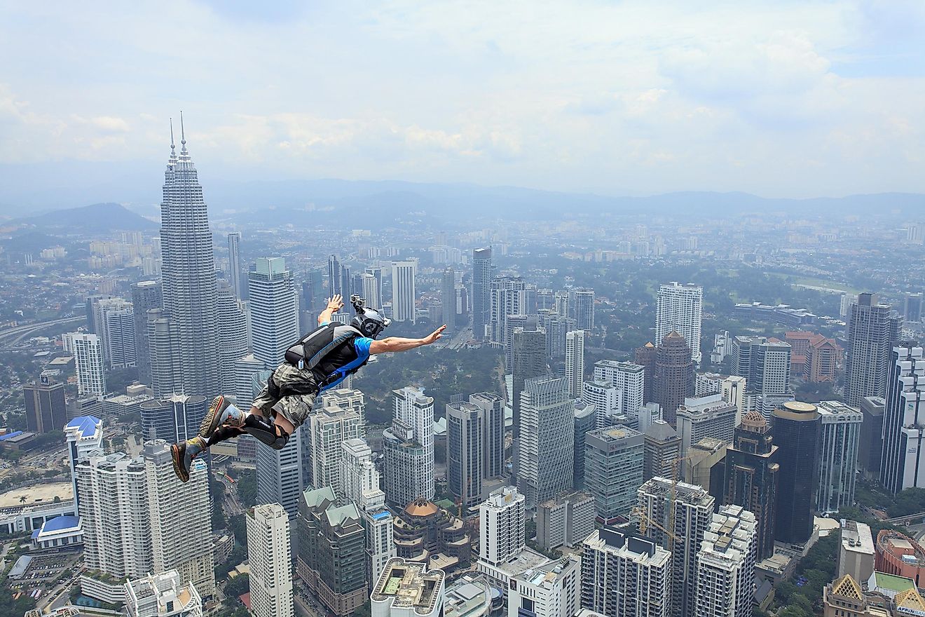 People like to climb and jump off significant buildings. Credit: Muslianshah Masrie / Shutterstock.com