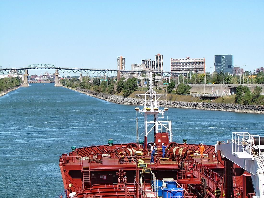 Tanker ship passing through Saint Lawrence Seaway near Montreal, Quebec, Canada.  Editorial credit: eWilding / Shutterstock.com