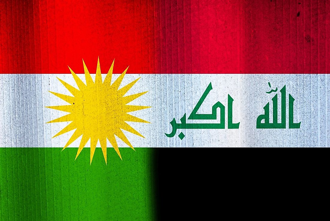 The flags of Iraq and Kurdistan. 