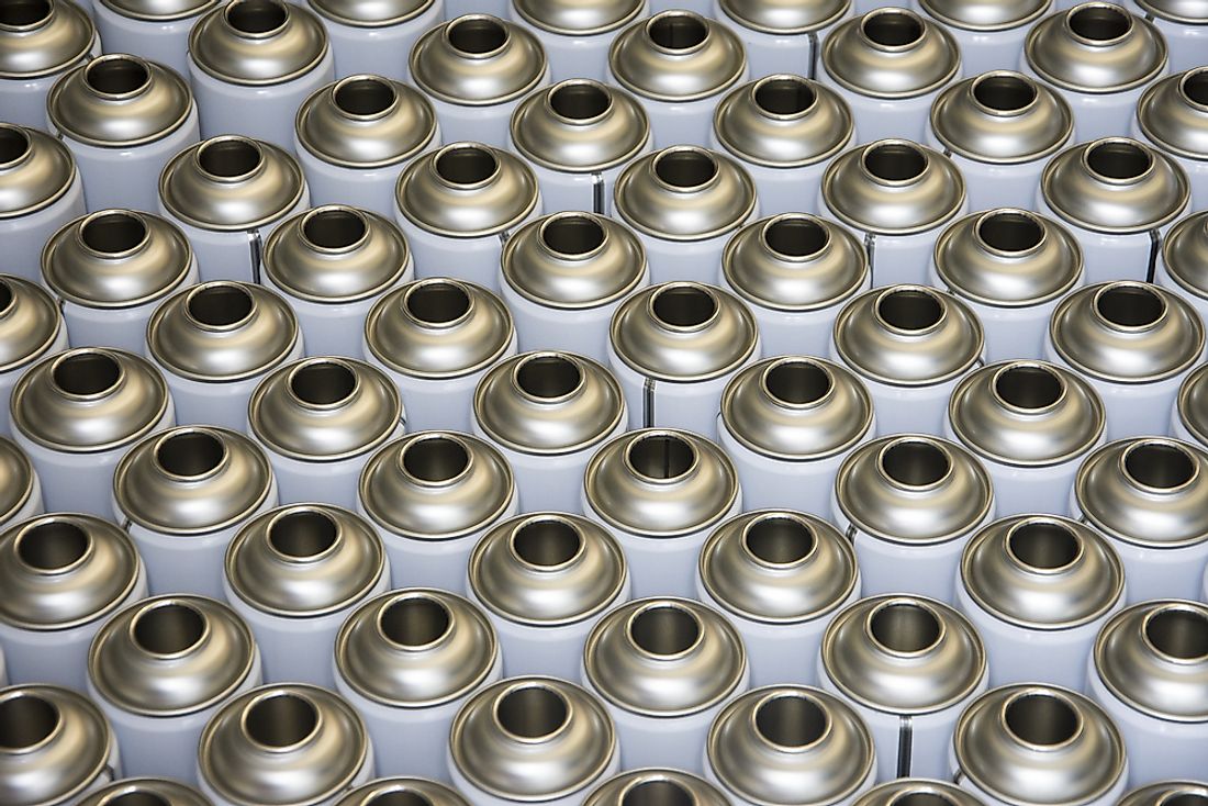 Rows of empty aerosol cans. 