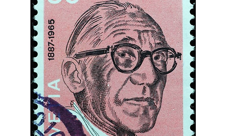 An Italian stamp with Le Corbusier's face. Editorial credit: spatuletail / Shutterstock.com.