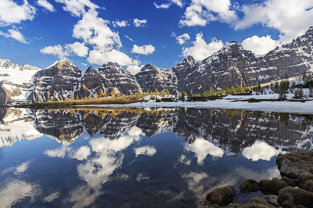 Reflections in lower Minnestimma Lake in Larch Valley above Moraine Lake, Banff National Park, Rocky Mountains Canada. Image credit :Zeljko Kozomara/Wikimedia.org