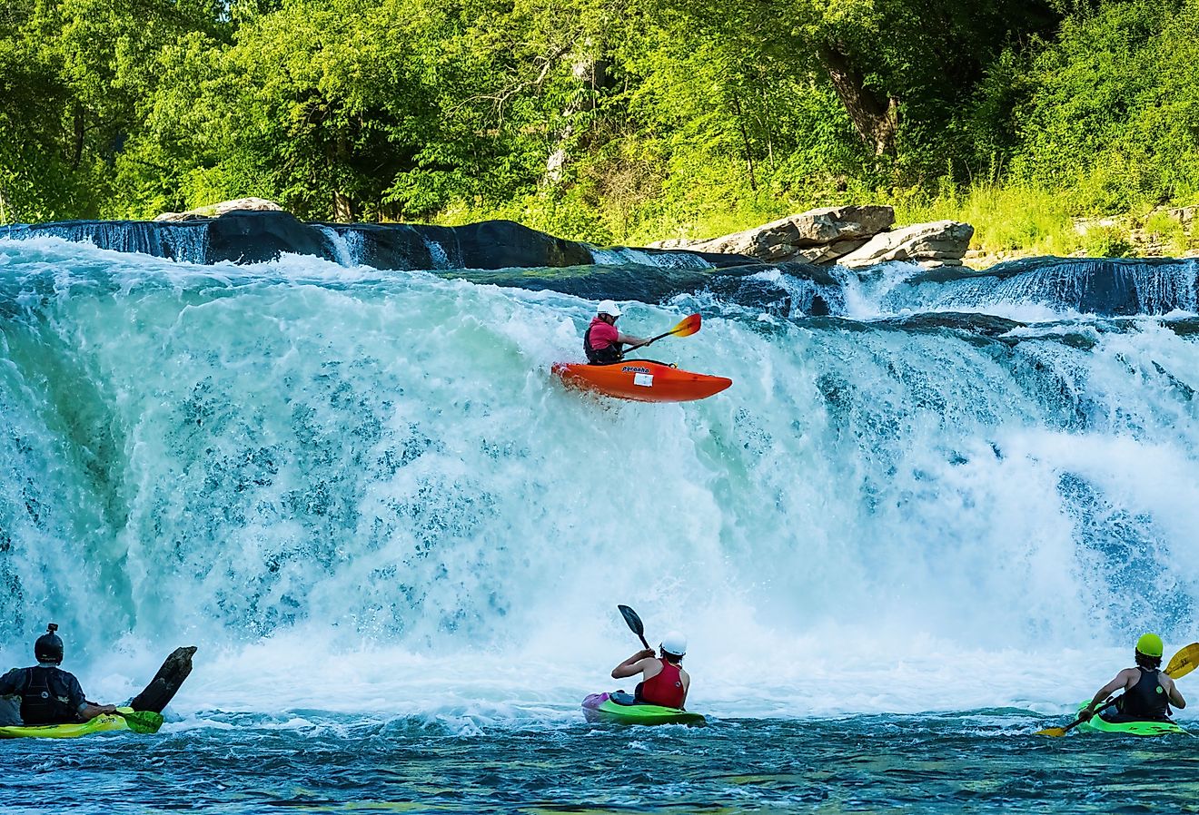 Group of kayakers going over Ohiopyle Falls in Ohiopyle, PA. Image credit Marked Imagery via Shutterstock.