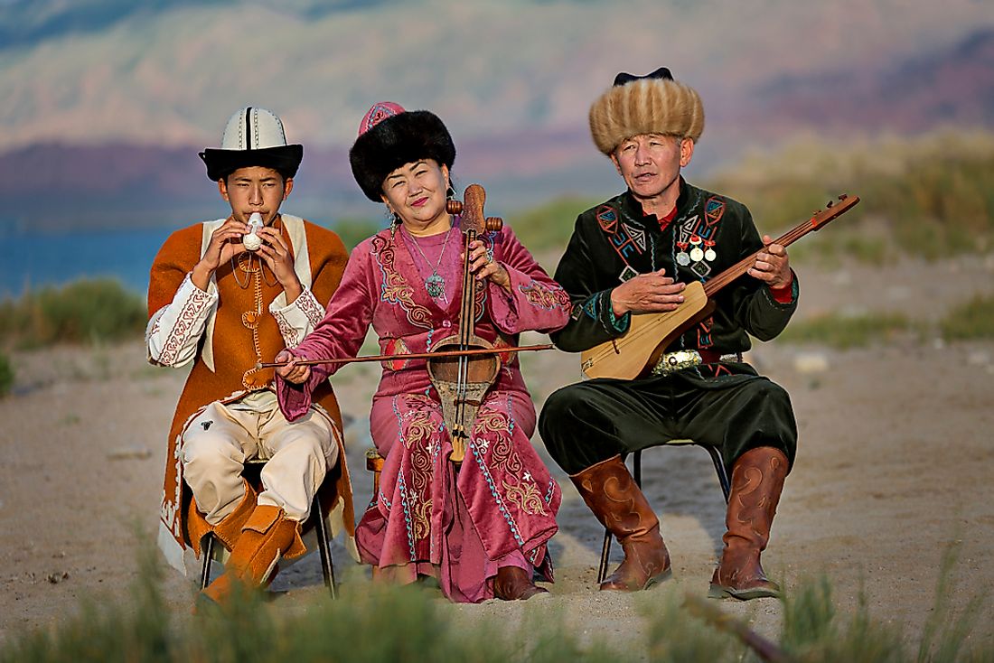 Kyrgyz play local instruments in Kyrgyzstan. Editorial credit: MehmetO / Shutterstock.com. 