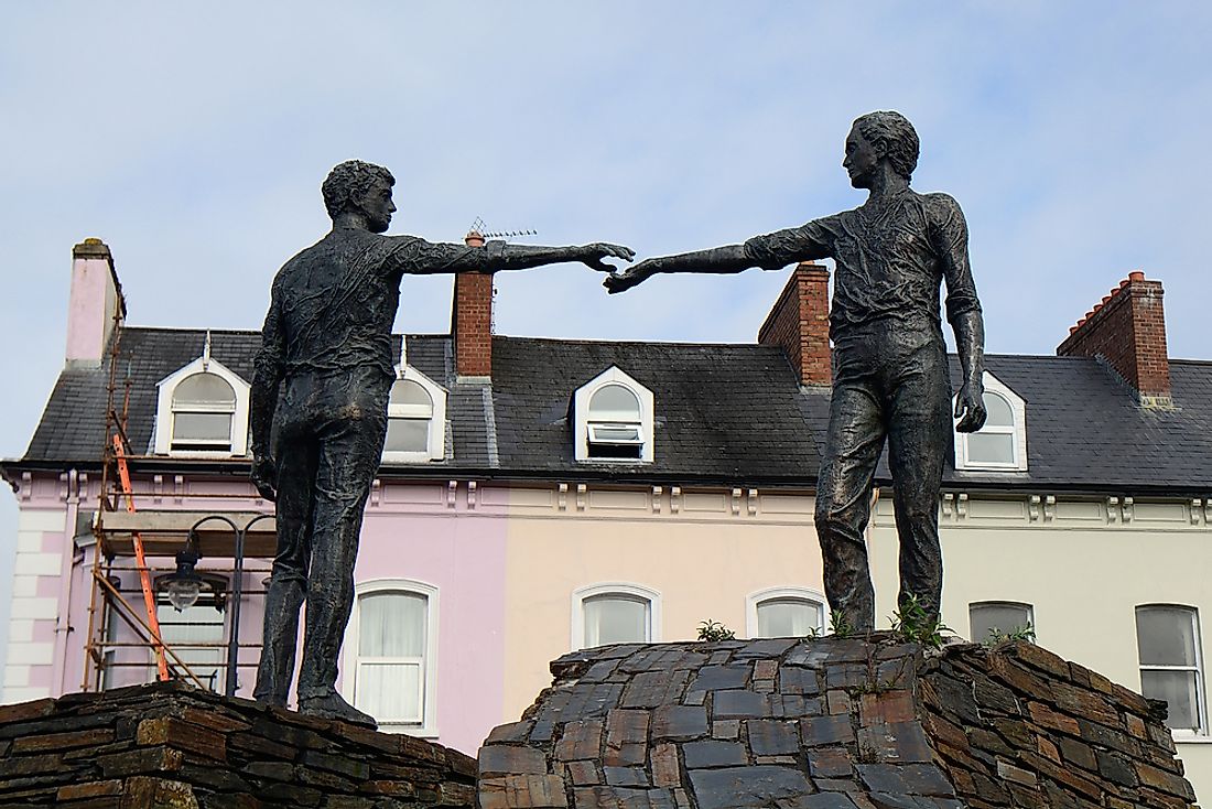 The Hands Across the Divide monument in Derry, Northern Ireland was erected 20 years after Bloody Sunday. Editorial credit: Attila JANDI / Shutterstock.com