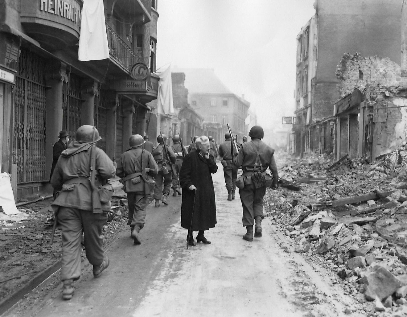 Infantrymen march through a German town at the end of WWII. Image credit: Everett Collection/Shutterstock