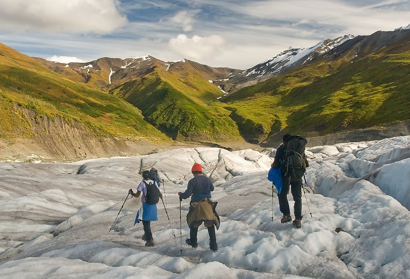 People hiking in Wrangell-St. Elias National Park and Preserve, Alaska.