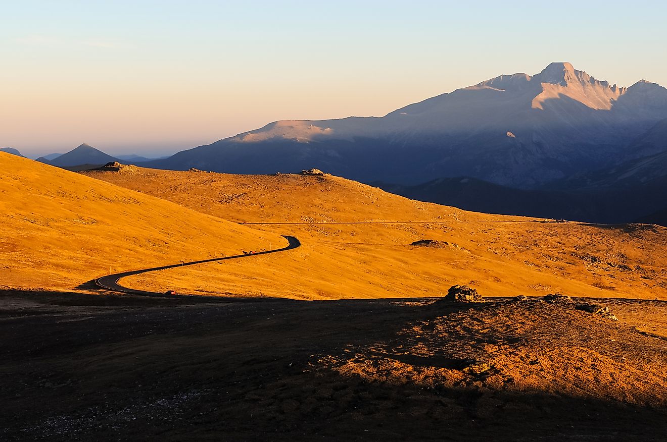 The setting of the autumn sun along Colorado's Trail Ridge Road, where the semi-arid foothills rapidly give way to the heights of the Rocky Mountains.