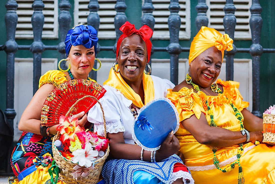 Women pose for a photo in Havana, Cuba. Editorial credit: BlueOrange Studio / Shutterstock.com. 