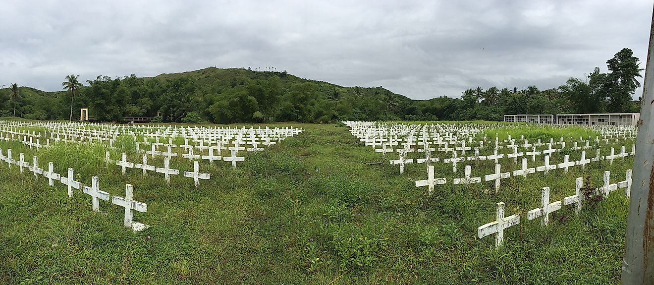 The Holy Cross Memorial Park in Tacloban City, Philippines, is a common grave to the thousands who died during the inslaught of typhoon Yolanda, or also known as Haiyan. Image credit: Lito_lakwatsero/Shutterstock.com