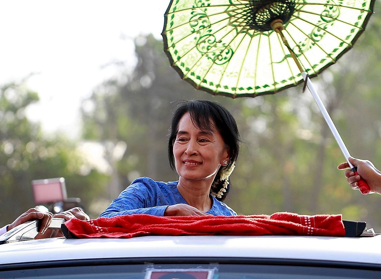Aung San Suu Kyi arrives to give a speech to the supporters during the 2012 by-election campaign at her constituency Kawhmu township, Myanmar on 22 March 2012. Image credit: Htoo Tay Zar/Wikimedia.org