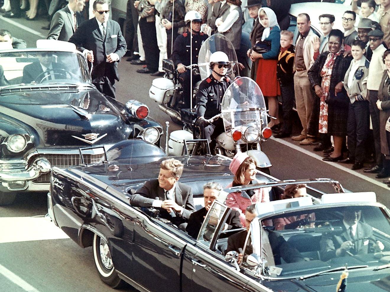 Picture of President Kennedy in the limousine in Dallas, Texas, on Main Street, minutes before the assassination. Image credit: Walt Cisco, Dallas Morning News/Public domain