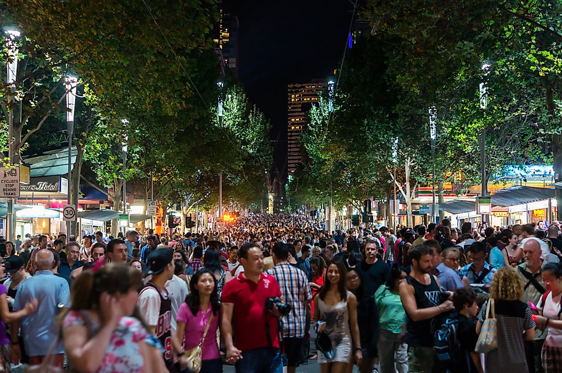 A crowd of people walk in Melbourne, Australia. Australia is a multicultural country. Editorial credit: Nils Versemann / Shutterstock.com.