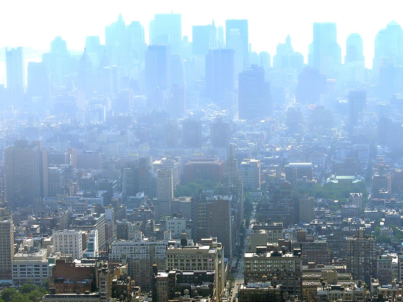 Manhattan's skyscrapers disappearing in the distance under a heavy blanket of smog and haze due to pollution. Image credit: KishoreJ/Shutterstock.com