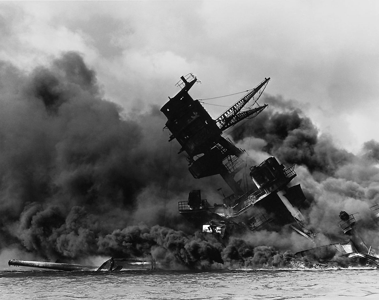 The USS Arizona (BB-39) burning after the Japanese attack on Pearl Harbor.