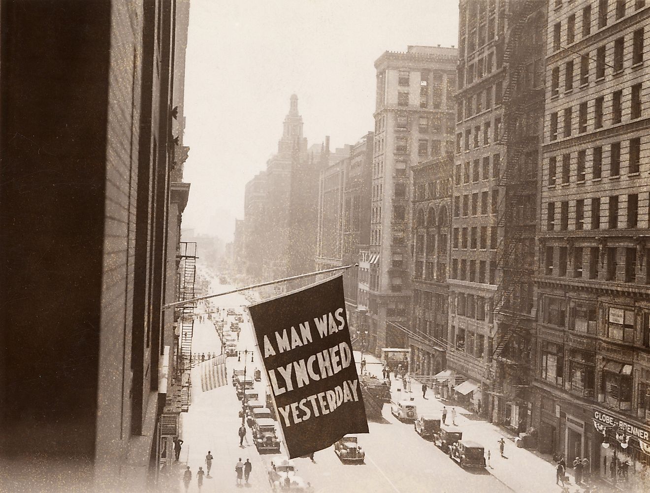 'A MAN WAS LYNCHED YESTERDAY,' is flown from the window of the NAACP headquarters on 69 Fifth Ave., New York City in 1936.Image credit: Everett Collection / Shutterstock.com