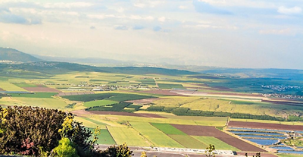 Vast expanses of fertile farmlands stretch out in the Jezreel Valley below the Samarian Highlands.