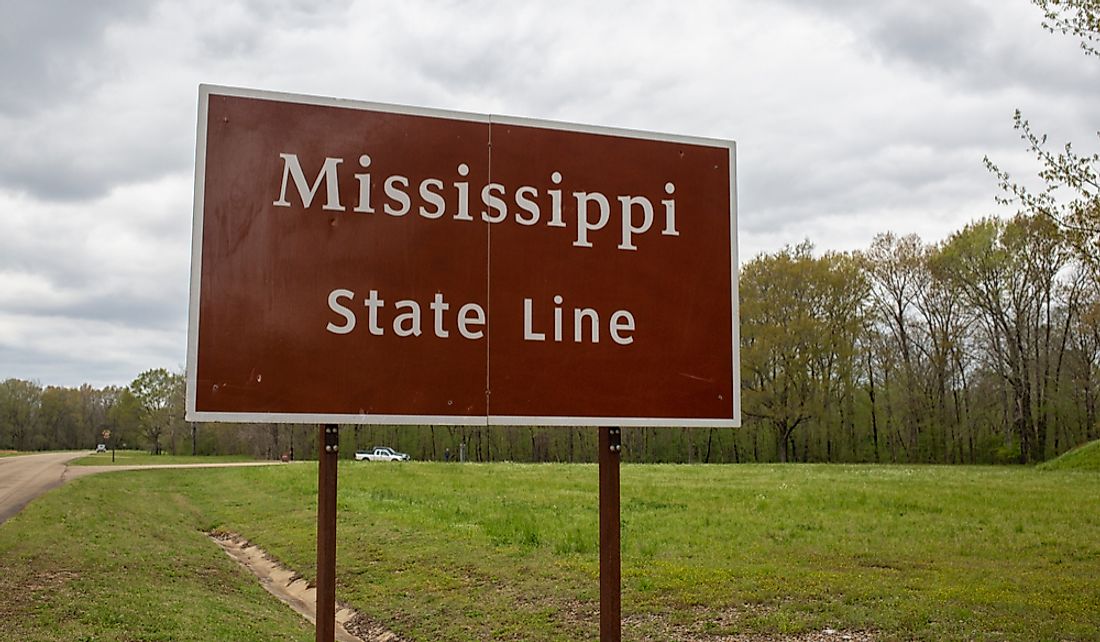 Sign marking the boundary line between the states of Mississippi and Alabama.