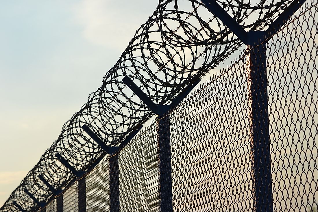 Barbed wire fences are important security features at private prisons. 