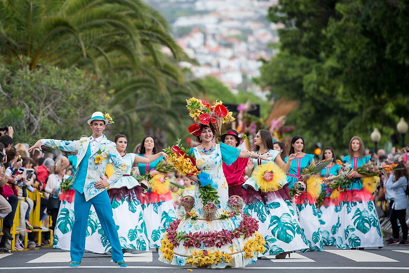 The Portuguese celebrating the annual Festa da Flor or Spring Flower Festival in the city of Funchal on the Island of Madeira in Portugal. Image credit: amnat30/Shutterstock.com