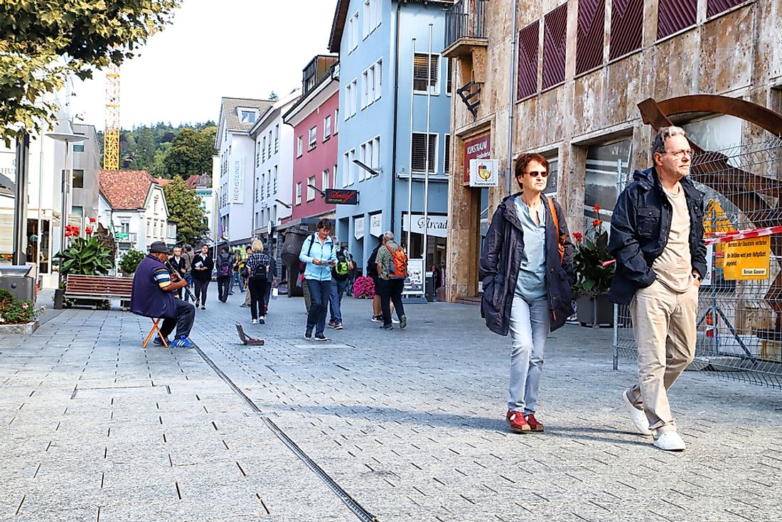 People walk in Vaduz, Liechtenstein. Editorial credit: KELENY / Shutterstock.com. 