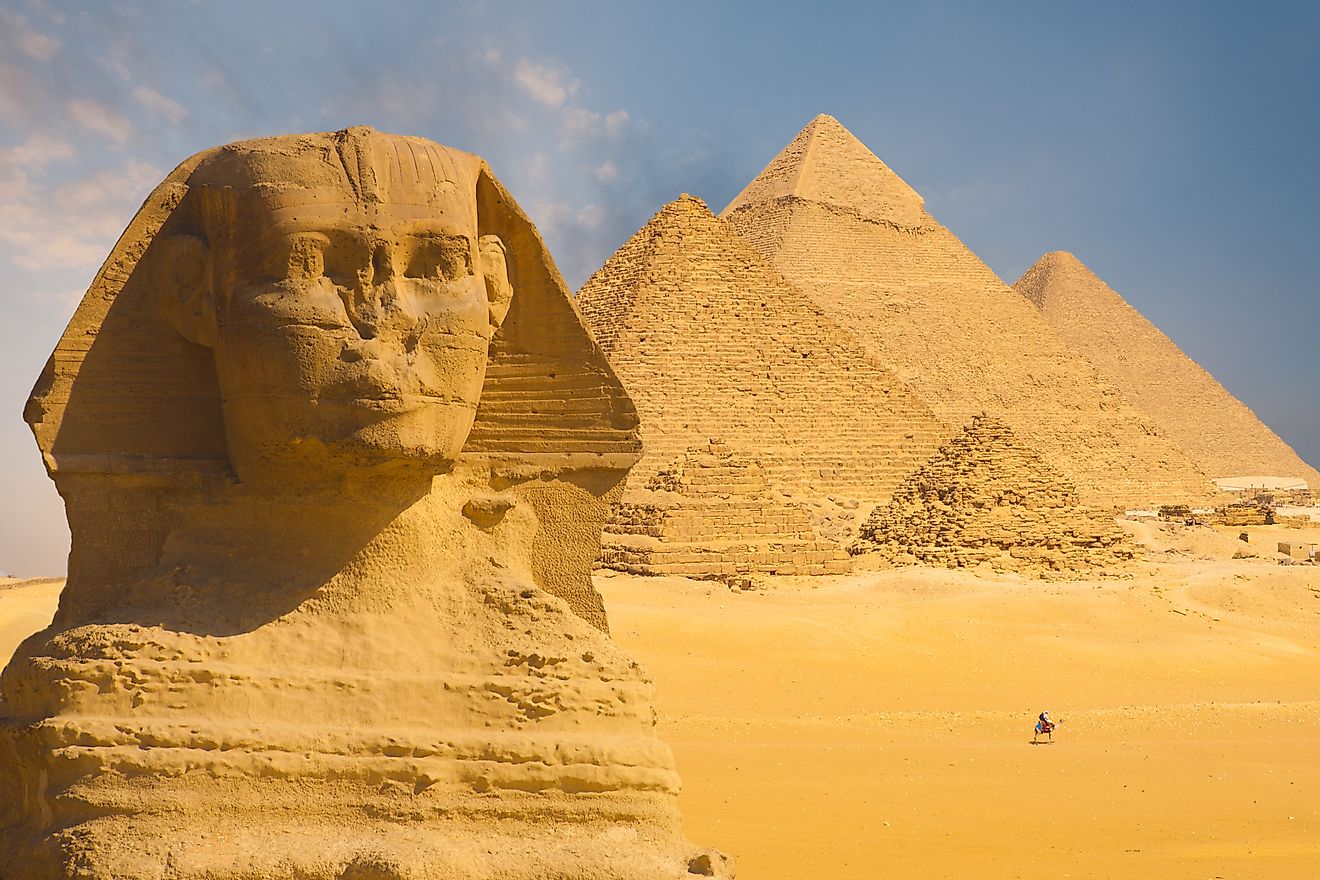The Great Sphinx of Giza with the Pyramid of Menkaure in the background in Cairo, Egypt.