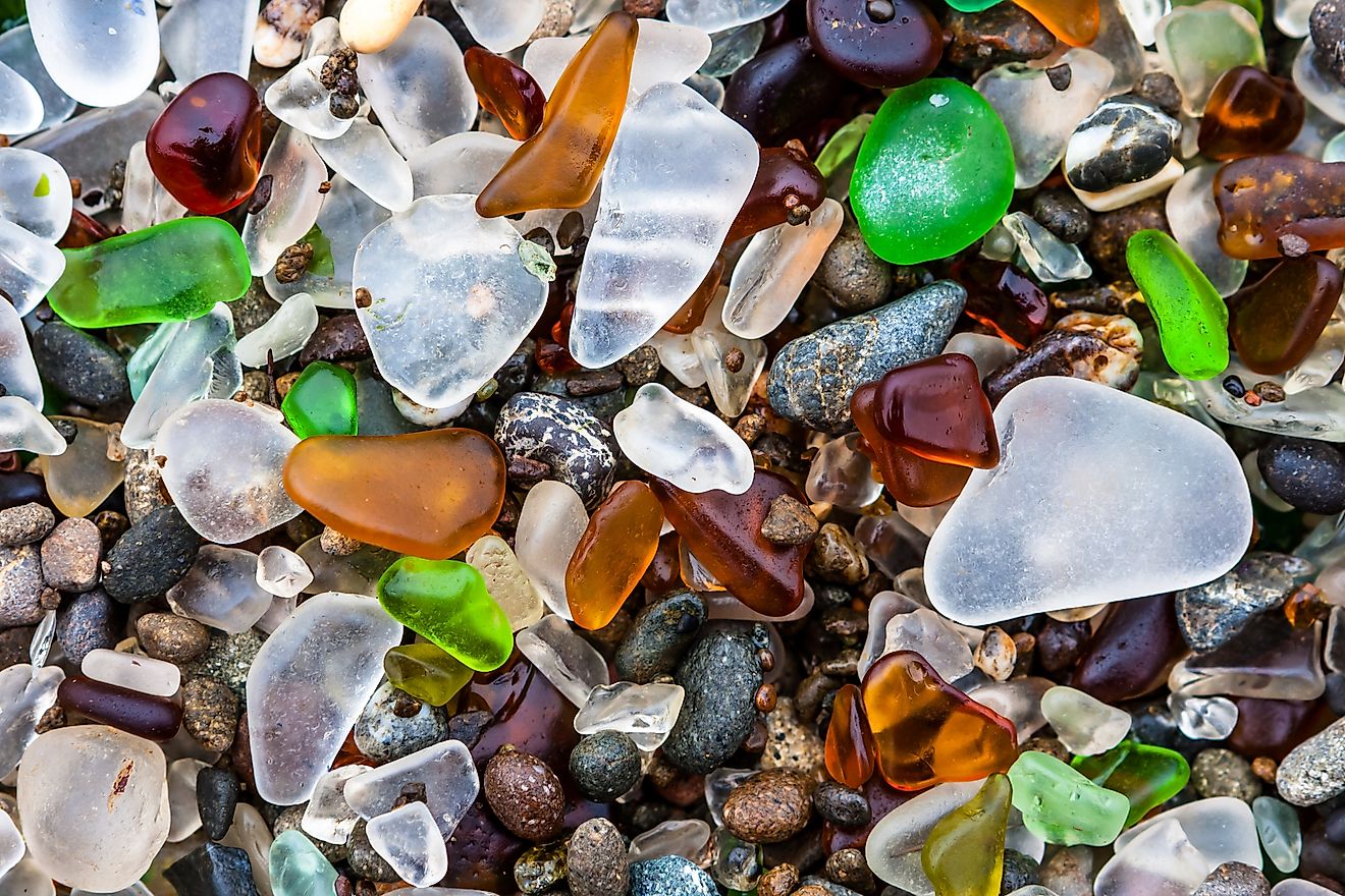 The polished glass pebbles offer a pretty sight to tourists visiting the Glass Beach.