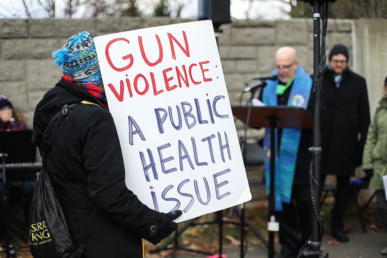 Protesters gather for a vigil outside of the NRA on the fifth anniversary of the Sandy Hook Elementary School shooting in Newtown, Connecticut in 2012. Image credit:  Nicole Glass Photography/Shutterstock.com