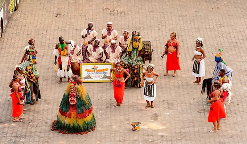 Togolese people perform a dance in traditional costumes in Lomé, Togo. Editorial credit: Anton_Ivanov / Shutterstock.com.