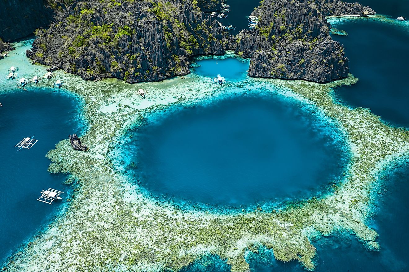 Aerial view of beautiful lagoons and limestone cliffs of Coron, Palawan, Philippines.
