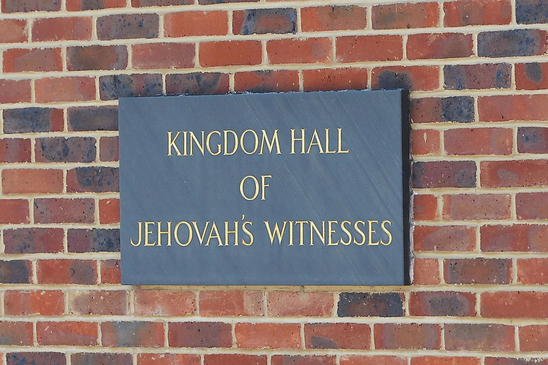 A sign for a Kingdom Hall of Jehovah's Witnesses in London, England. Editorial credit: 1000 Words / Shutterstock.com.