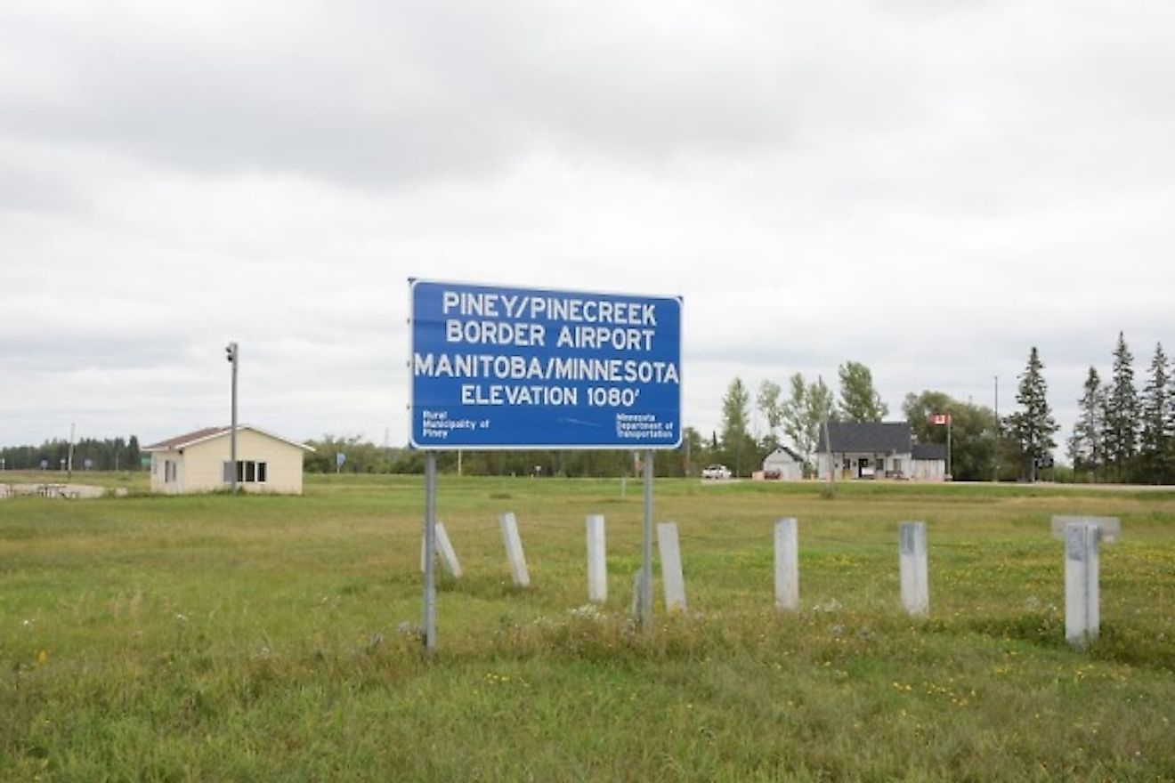 The Piney Pinecreek Border Airport is shared between Manitoba, Canada, and Minnesota, US. Image credit: www.clui.org